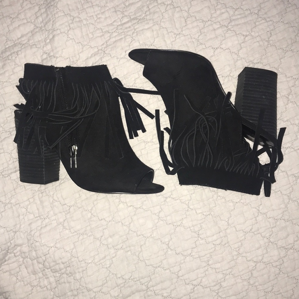 Black fringe booties.